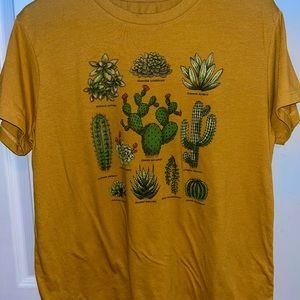 Yellow woman’s tee. Fits like a medium.